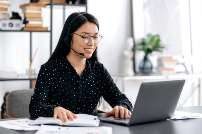 happy friendly young asian woman wearing glasses a 2026 01 08 07 12 44 utc