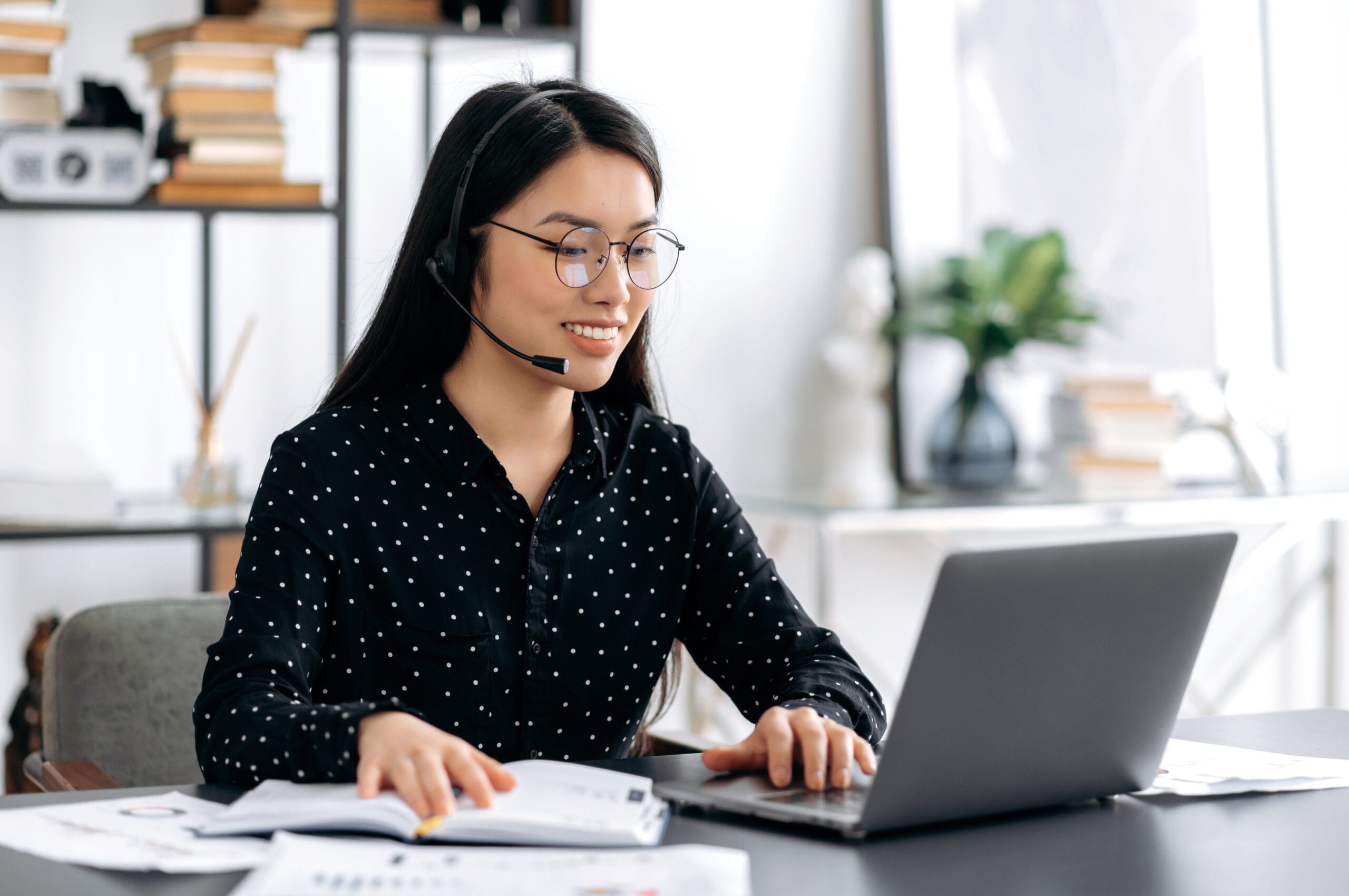 happy friendly young asian woman wearing glasses a 2026 01 08 07 12 44 utc